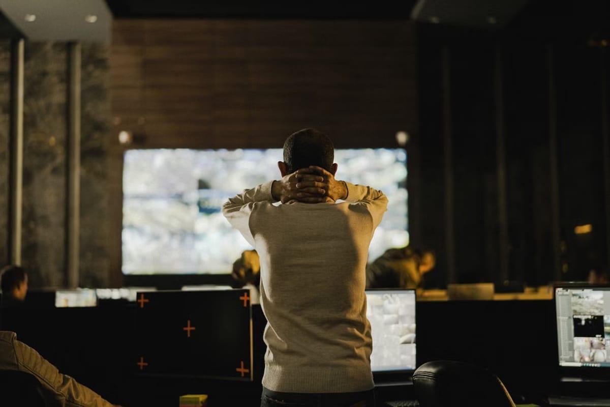A Stormrake operator monitoring custody systems across multiple screens
