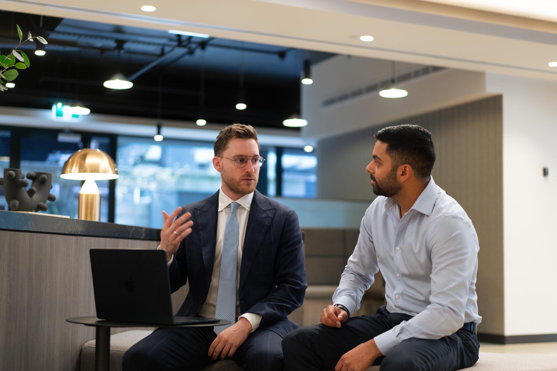 A Stormrake broker talking a client through their account