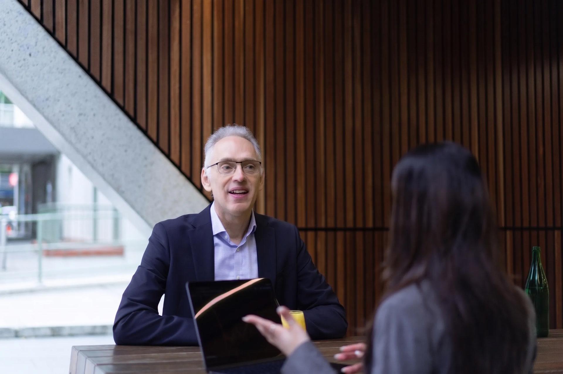 A client discussing their self-managed super fund with a Stormrake broker